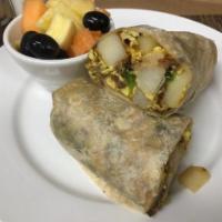 Breakfast Burrito · Served with scrambled eggs, home fries, and cheddar cheese with bacon, sausage or ham. Serve...