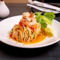 Papaya Salad  · Green Papaya, Carrots , Tomatoes, Green Bean, Peanuts in Chili Lime Juice and Shrimp.