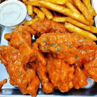 10 pc Wing Combo · 10 golden fried wings, with your choice of sauce, regular fries and an ice-cold drink.