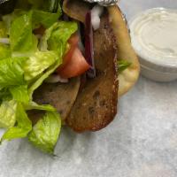 Gyro · Lettuce, tomatoes, onions and gyro sauce.
