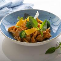 Mango Chicken · Chicken breast tossed in wok with basil, onions, mango, and mango puree. Served with fresh m...