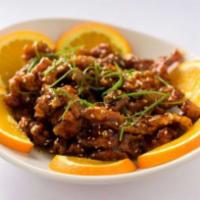 Sesame Chicken · Strips of chicken fried in a sweet and tangy sauce topped with a sprinkle of sesame seeds.