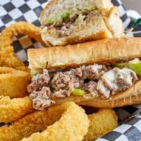 Philly Sub · Steak or chicken served with mayo, onions, Swiss cheese and green bell peppers. Includes fri...