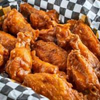50 Pieces Bone-In Wings · Bone-in wings, with choice of 2 flavors. Served with ranch. Carrot sticks are available upon...