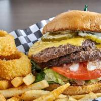 1/2 lb.Belly Buster Burger Special · Double cheeseburger with fries, onion rings and drink. 