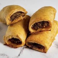 Sausage Roll · Seasoned ground sausage meat rolled in dough and baked to perfection.