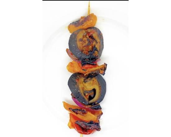Snail Kebab · Seasoned grilled snail arranged in a kebab stick layered with assorted bell peppers and onions.