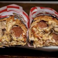 Shawarma · Thinly sliced cuts meat of your choice layered with cabbage, carrot, and chicken frank and o...