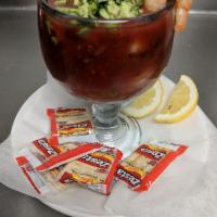 Shrimp Cocktail · Shrimp served in a tasty sauce with chunks of onion, cucumber, avocado, tomatoes, cilantro, ...