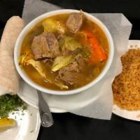 Cocido (Beef Soup) · Seasonal. Made from beef shanks, carrots, potatoes, corn, cabbage, and zucchini. Served with...