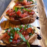 Bruschetta Con Pomodori · Toasted country bread, fresh chopped tomatoes, garlic, fresh basil, EVOO