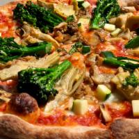 Primavera Pizza · Tomato, mozzarella and seasonal garden vegetables.