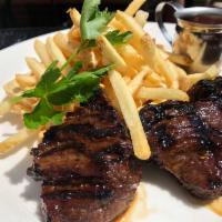 Steak Tips · Bourbon style marinated steak tips, served with hand cut fries. Contains dairy in preparation.