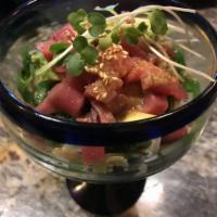 Tuna Tartare · Miso marinated blue fin tuna, avocado and brown garlic lemon soy sauce.