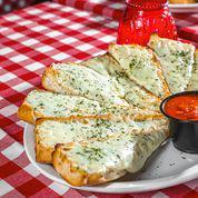 Cheesy Garlic Bread · Topped with fresh garlic and butter, smothered with mozzarella cheese and baked until golden brown, served with our homemade marinara sauce.
