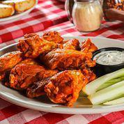 Bottoms Up Chicken Wings · Your choice of spice level, served with celery sticks and our homemade tasty bleu cheese or ranch dip.