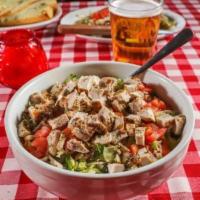 Pizano's Chopped Salad · Chopped lettuce, basil, bacon, chicken breast, diced tomatoes and mozzarella cheese tossed i...