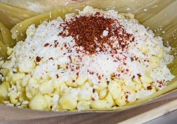 Esquite · Sweet corn (served warm), mayonnaise, crumbled queso cotija ,chili powder and lime juice.