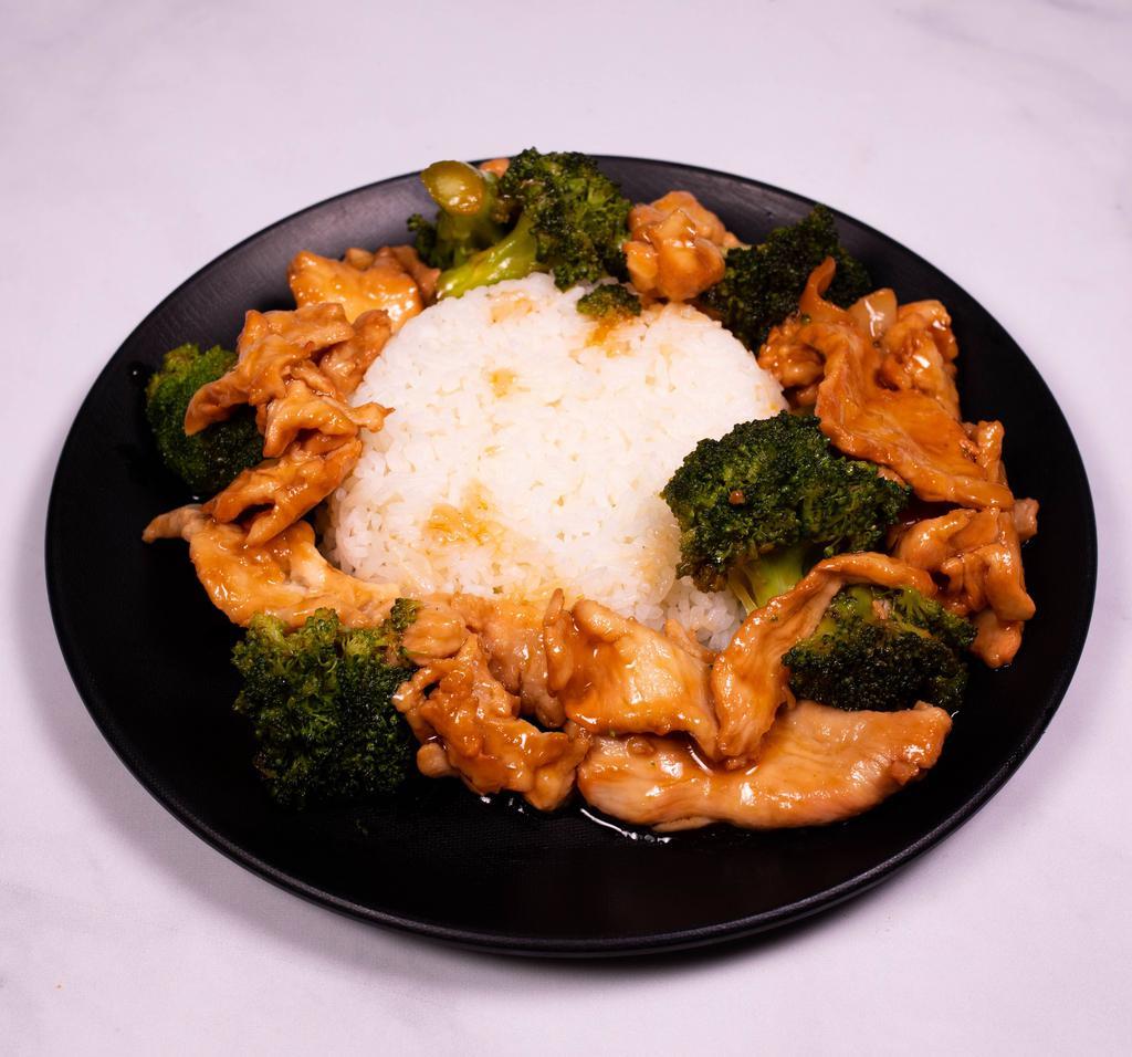 44. Chicken with Broccoli · Served with white rice.