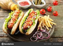 2 Hot Dogs  · Comes with fries on a long roll with your choice of fixings.