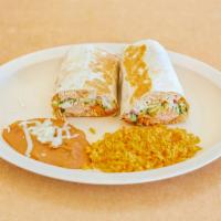 Burrito Dinner · Your choice of meat with beans, rice, cheese, lettuce, tomato, and sour cream. Served with r...