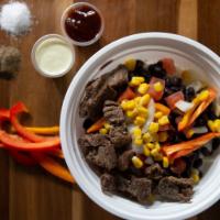 steak bowls · white rice,onion,tomato,pepers,corn,black beans,beef steak