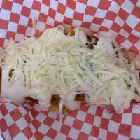 Jamon y Queso Cachapa · Jamon, queso de mano, nata y queso rayado.