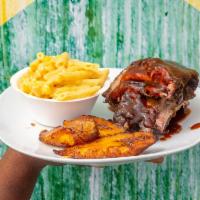 Home Style Baby Back Ribs (Combo) · 
Baby back ribs marinate in Jerk seasoning and grilled to perfection then tossed in homemade...