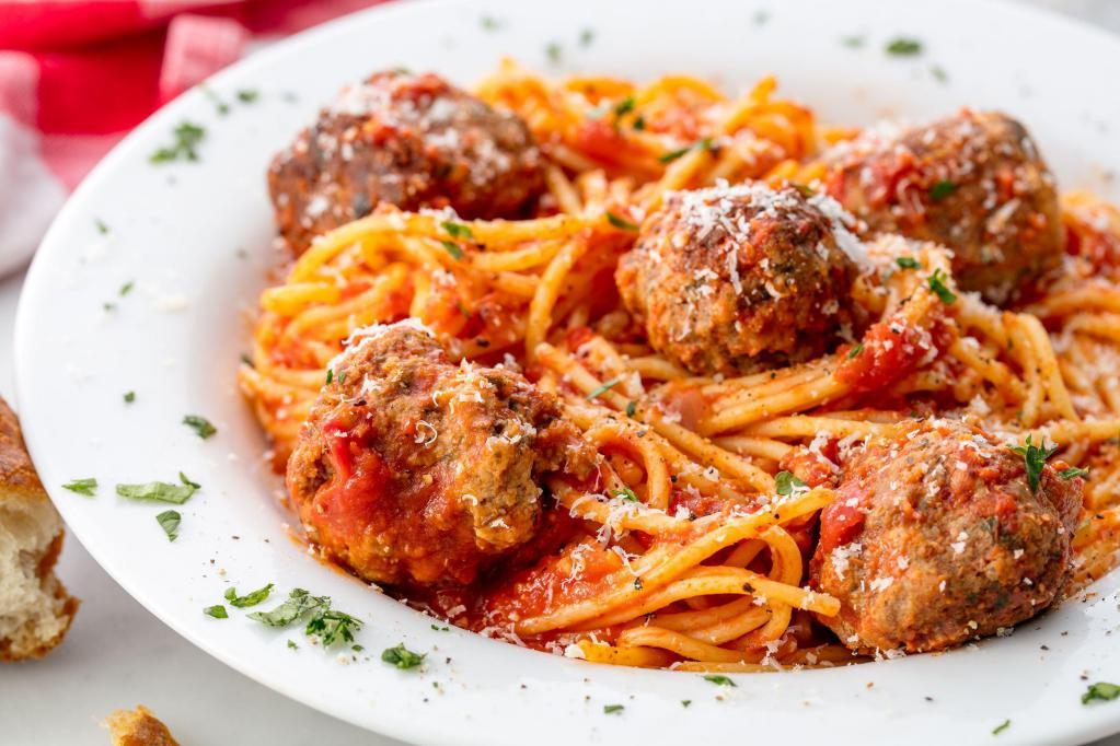 FAMILY SPAGHETTI & MEATBALL  · A classic dish with freshly peeled tomatoes, herbs, olive oil and garlic simmered to perfection.GARDEN SALAD with dressing on the side