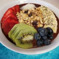 Acai Bowl · Shredded coconut, almonds berries, kiwi, bananas, granola and chila seeds.