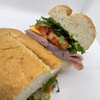 Ham Sandwich · Honey Glazed Ham, Shredded Lettuce, Sliced Tomato, Sliced American Cheese, and Mayo served o...