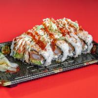 Red Dragon Roll · Spicy crab tempura, eel, avocado and cream cheese. Topping crab salad and red tobiko, eel sa...
