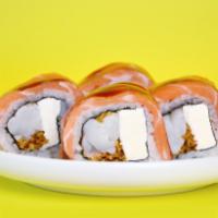 Phoenix Roll · Steamed wild white shrimp, philadelphia and crispy onion, topped with scottish salmon and ee...