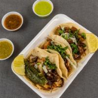 Buche Taco · Hand Made Tortillas, Including Onion, Cilantro And Lime.  