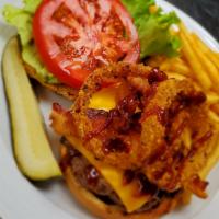 BBQ Bacon Burger · 6 oz. patty served with American cheese, onion rings, tomatoes and lettuce on toasted sesame...