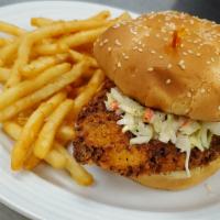 Hot and Spicy Sandwich · Golden fried, house-battered chicken, with coleslaw and sweet and spicy aioli on toasted ses...
