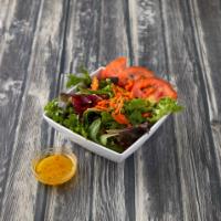 House Salad · Spring mix, tomato and shredded carrot