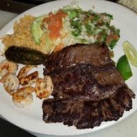 Platillo Ranchero Dinner · Shrimps, steak, salad and pico de gallo.
