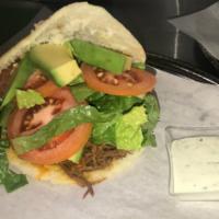 Tropical Arepa · Shredded Beef or chicken, avocado, lettuce and tomato