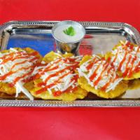 4 Tostones · Fried green plantain with cheese and ketchup