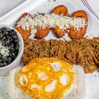 Pabellon Criollo · Rice, Black Beans, Shredded Beef, sweet plantains, cheese, egg