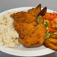 Pechuga de Pollo empanizada / milanesa de pollo · breaded chicken, rice, plantains, salad