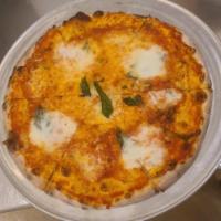 Margherita Pizza · Local mozzarella, San Marzano tomato sauce, basil.