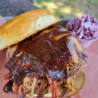 Pulled Pork Sammie · Generous portion of our house smoked pork on a brioche bun with choice of cheese, smokey cit...