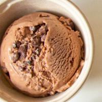 Pint Chocolate Bomb · 73% Dark chocolate in our vegan coconut base with crunchy cacao nibs.