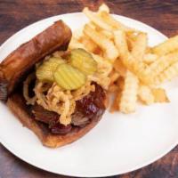 BBQ Brisket Sandwich · bbq brisket, pickles topped with crispy onions on buttery texas toast 