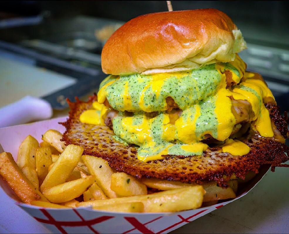 Mac & Cheeseburger · Comes with fries. Has cheese sauce and salsa verde (cilantro green sauce).
