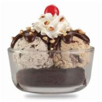 Brownie Sundae · Top of a brownie with your choice of 2 ice cream flavors and your choice of a wet topping, a...