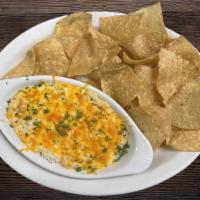 Crab Dip · Creamy house recipe, loaded with crab meat. Served with tortilla chips.