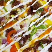Pizzogi Pizza (Korean) · Marinated steak, bell pepper medley, red onions, jalapenos, scallions, drizzled with chili g...